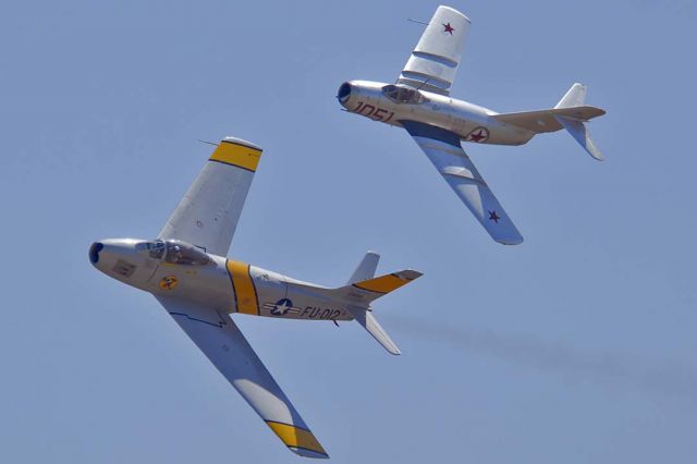 PZL-MIELEC SBLiM-2 (NX87CN) - MiG-15 NX87CN performed with North American F-86F Sabre NX186AM at the Planes of Fame Airshow at Chino, California on May 15, 2010