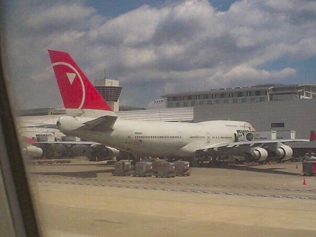 Boeing 747-400 (N662US) - Everyone misses the red tails!  Northwest 747 at Detroit in July 2007.