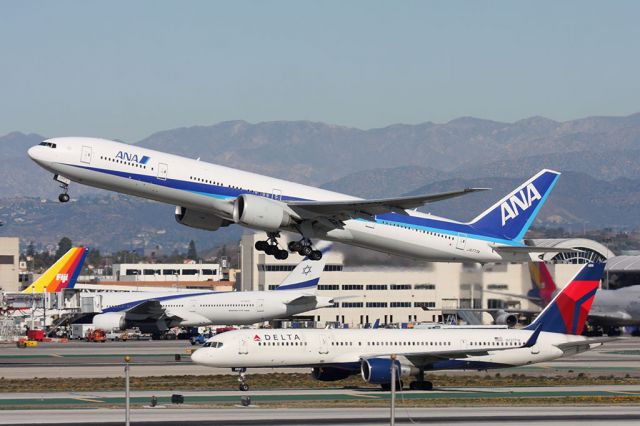 BOEING 777-300ER (JA777A) - All Nippon Airways JA777A (FLT ANA5) departing RWY 25R en route to Tokyo Narita Intl (RJAA/NRT).  [KLAX - 12-25-2011]