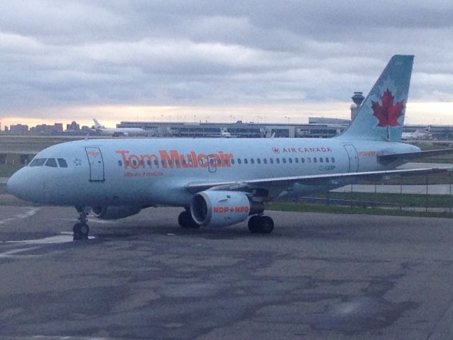 Airbus A319 (C-GBIP) - Federal Election time in Canada. Here is the NDP party plane. A319 operated by Air Canada.  It was parked up at Landmark FBO at the north end of YYZ. br /Notice the hashtag near the tail. #TM4PM 