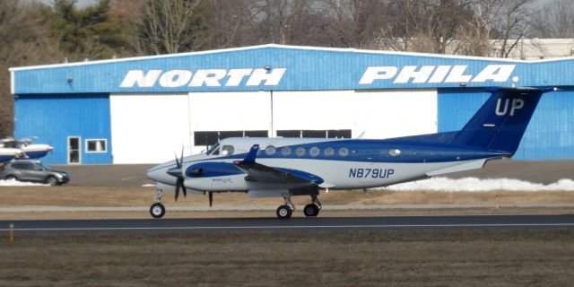 Beechcraft Super King Air 350 (N879UP) - On the active runway for departure is this 2016 Beechcraft Super King Air 350 in the Winter of 2021.