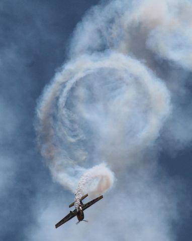 EXTRA EA-300 (VH-IOG) - Aerobatics champion Matt Hall giving The Extra a good spiral workout at the November Warbirds show