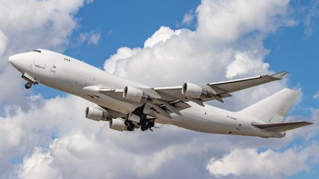 Boeing 747-400 (N445MC) - March 17, 2019, Miami, Florida -- This Boeing 747-4B5F, call sign "Giant 5-5 Heavy", is departing off runway 27.