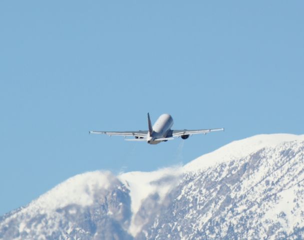 Airbus A319 (N340NB) - Wheels up and off 31L on 01/22/2011