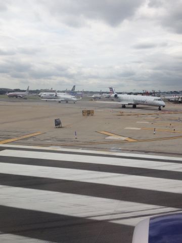 Boeing 737-900 (N826DN) - Rush hour at KLGA 8/22/14