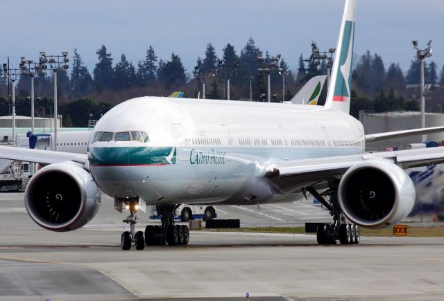 Boeing 777-200 (B-KQD) - Cathay Pacific B-KQD departing Paine Field on first flight February 5, 2013.