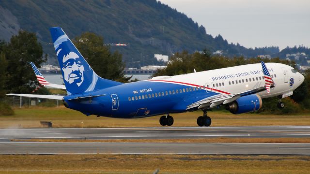 Boeing 737-800 (N570AS) - ASA/AS88 to Anchorage PANC/ANC lifting off with Pier 3 and downtown Kodiak in the background.br /Reg: N570ASbr /MSN: 35185br /Type: Boeing 737-890--B738--73Hbr /"Honoring Those Who Serve" livery