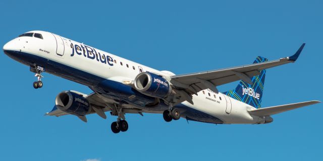 Embraer ERJ-190 (N229JB) - JetBlue Airways Embraer 190AR nicknamed "Blue Amigo" arriving from Raleigh-Durham landing on runway 29 at Newark on 9/26/21.