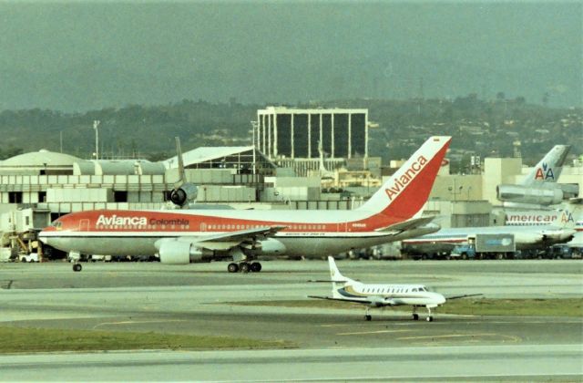 BOEING 767-200 (N986AN) - KLAX - I was filming the Metro when an Avianca 767-200 series rolled through the background at Los Angeles....Imperial Hill was a distant 2nd to the old Imperial Terminal Lot when it was open.This 767 is Serial number 24835 LN:321 and scrapped.