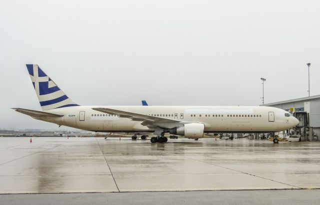 BOEING 767-300 (N328PM) - Looking forlorn in the rain this is the ex-SkyGreece plane that has sat idle at YYZ for a couple of months now. Shes been stripped of her titles and given a new reg which until recently belonged to a Dornier 328jet. The FAA database says this reg is not assigned, but there it is. No word yet on new owners.