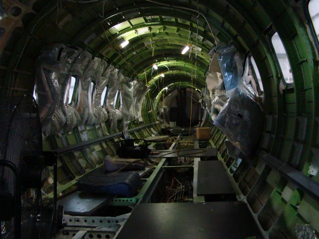 Embraer ERJ-135 — - Interior removed for corporate seating and associated mods. EMB-135 at Embraer Nashville.