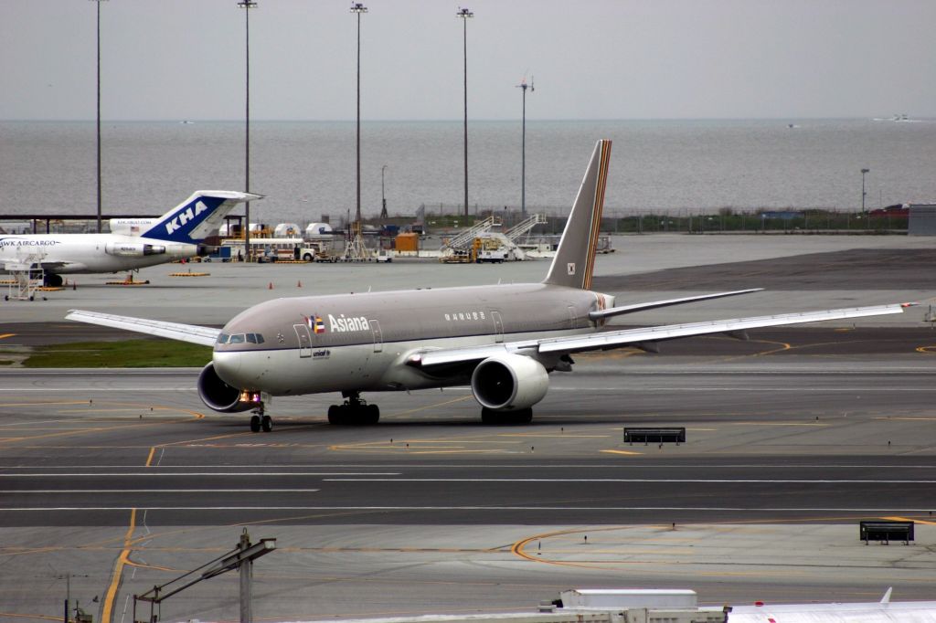 Boeing 777-200 (HL7597) - KSFO - Asiana 777-200 crossing 28L to the gate