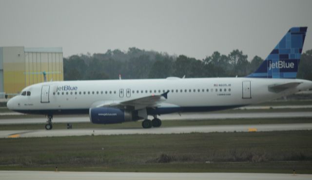 Airbus A320 (N605JB) - Taxiing to gate at RSW on 02/11/2011