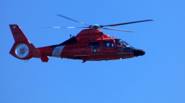 Aerospatiale Dauphin 2 (SA-365C) — - Making a low pass is this Aerospatiale HH-65 Dauphin Rotorcraft out of the base in Atlantic City New Jersey in the Spring of 2019. The Registration Number is 6571.