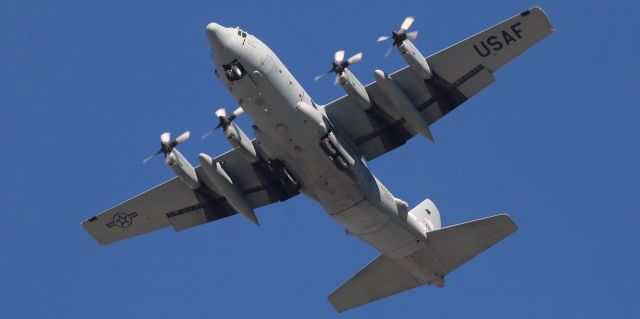 Lockheed C-130 Hercules (92-0549) - One in a flight of eight, a Nevada Air Guard High Rollers C-130H (92-0549) passes over my position only a few seconds before executing a break to come around for landing on RTIAs runway 16R.