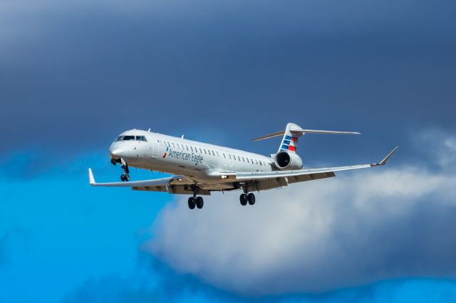 Canadair Regional Jet CRJ-900 (N244LR) - A Mesa Airlines CRJ900 landing at PHX on 2/26/23. Taken with a Canon R7 and Tamron 70-200 G2 lens.