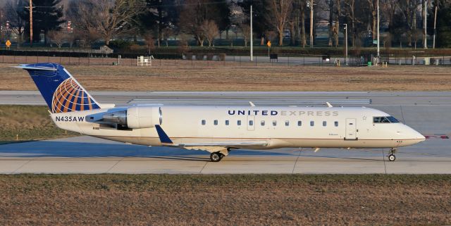 Canadair Regional Jet CRJ-200 (N435AW) - Early morning departure for United Express (Air Wisconsin) 3849 to Chicago O'Hare International (KORD). Here N435AW taxi's down taxiway aplha at KLEX Lexington Bluegrass Airport.