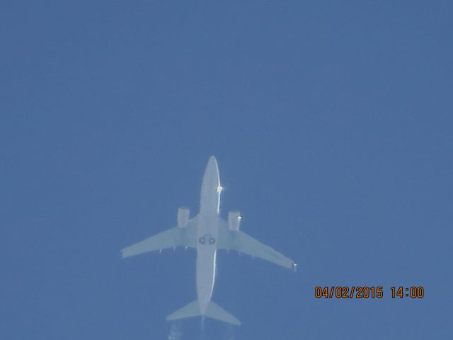 Boeing 737-700 (C-GSWJ) - WestJet Airlines flight 2437 from CUN to YWG over Southeastern Kansas at 38,000 feet.