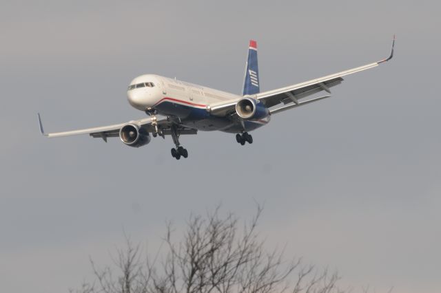 Boeing 757-200 (N936UW) - Getting blown about a bit on final by some strong wind gusts. Let's get that approach stabalized boys!