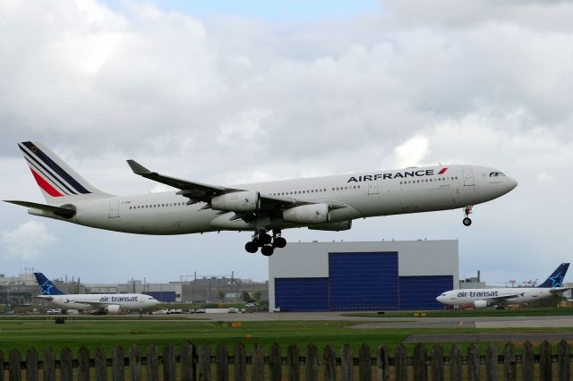 Airbus A340-300 (F-GNII) - Arriving from Paris CDG airport.