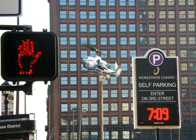 — — - A USMC AH-1 (165449) hovering in for a landing in downtown Cleveland on 10 Jun 2012 in preparation for Marine Week 2012.