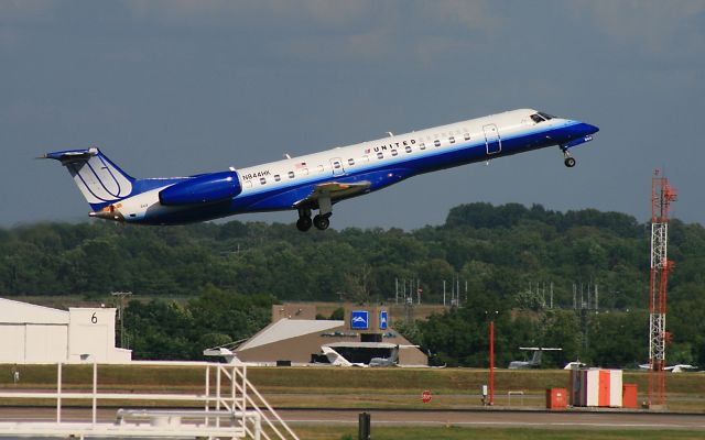 Canadair Regional Jet CRJ-700 (N844HK) - Embraer 145LR climbs out of 20R