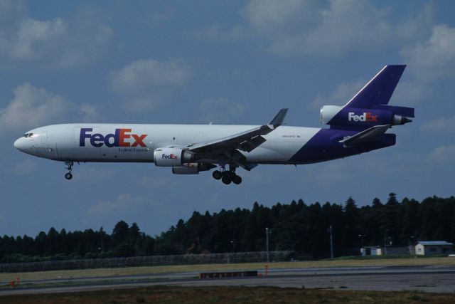 Boeing MD-11 (N603FE) - Short Final at Narita Intl Airport Rwy16R on 1995/09/09