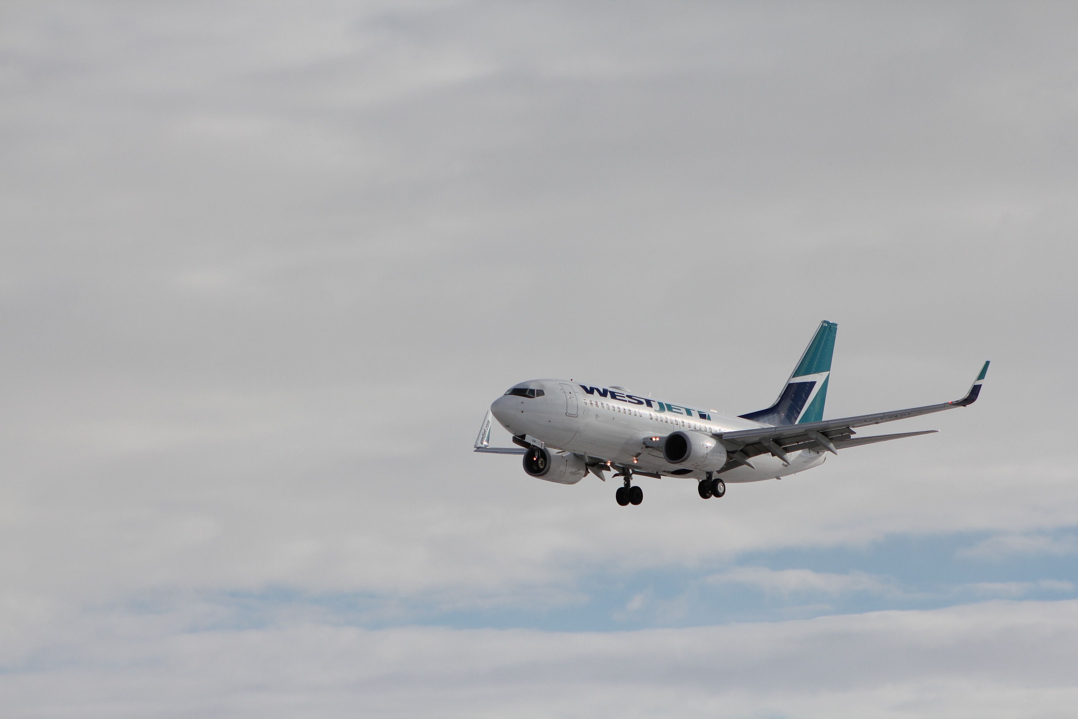 — — - Westjet