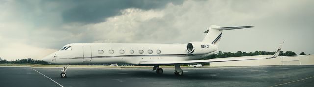 Canadair Challenger (N540W) - Not sure who it was but was parked near the west ramp. Stitched 14, 24 megapixel images together for a large wall print.