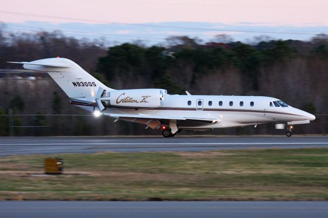 Cessna Citation X (N930QS) - NetJets Aviation's 2000 Cessna 750 Citation X N930QS (FLT EJA930) rolling out on RWY 23 after arrival from Northeast Philadelphia (KPNE) in the early evening.