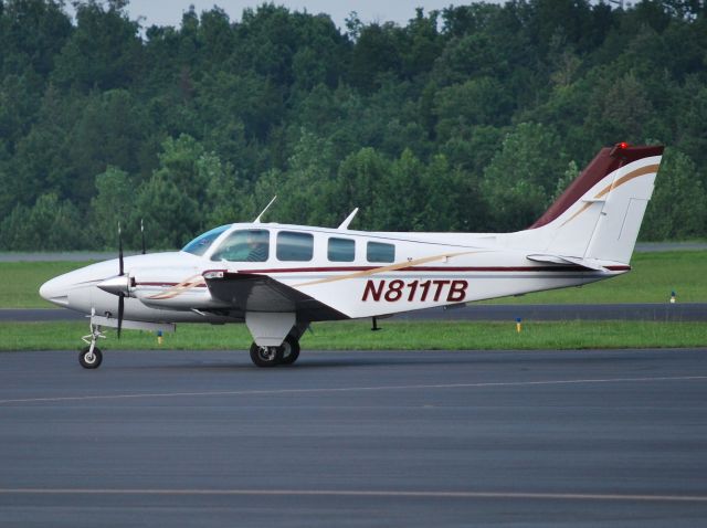 Beechcraft 55 Baron (N811TB) - VAN DYKE ASSOCIATES INC arriving at KJQF - 7/28/13