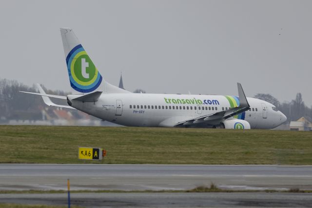 Boeing 737-700 (PH-XRY) - West of runway R22