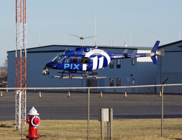 Bell JetRanger (N11TV) - LINDEN AIRPORT-LINDEN, NEW JERSEY, USA-FEBRUARY 08, 2023: A news helicopter from one of the local New York City television stations is seen by RF taking off after refueling at approximately 1551 hours.