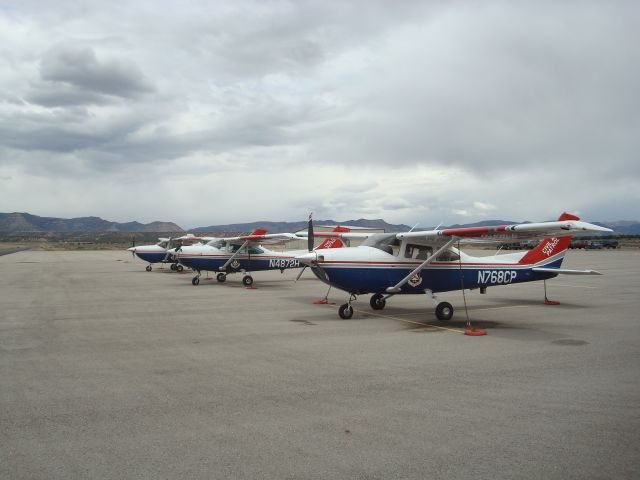 N768C — - Three on the ramp at Price-Carbon County, Utah, for a search and rescue exercise 14 May 2011.