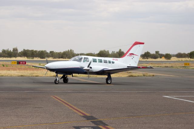 Cessna 402 (VH-CAJ) - Taxiing to Chartair GA via Echo after exit from RWY 12, Arrival from YTNK