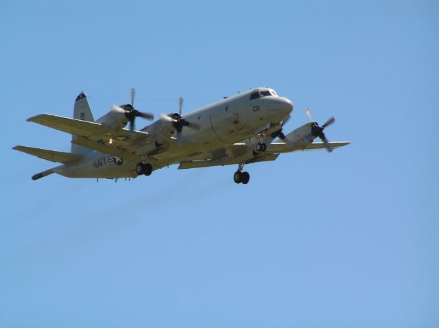 Lockheed P-3 Orion — - Final approach to 28L at PDX