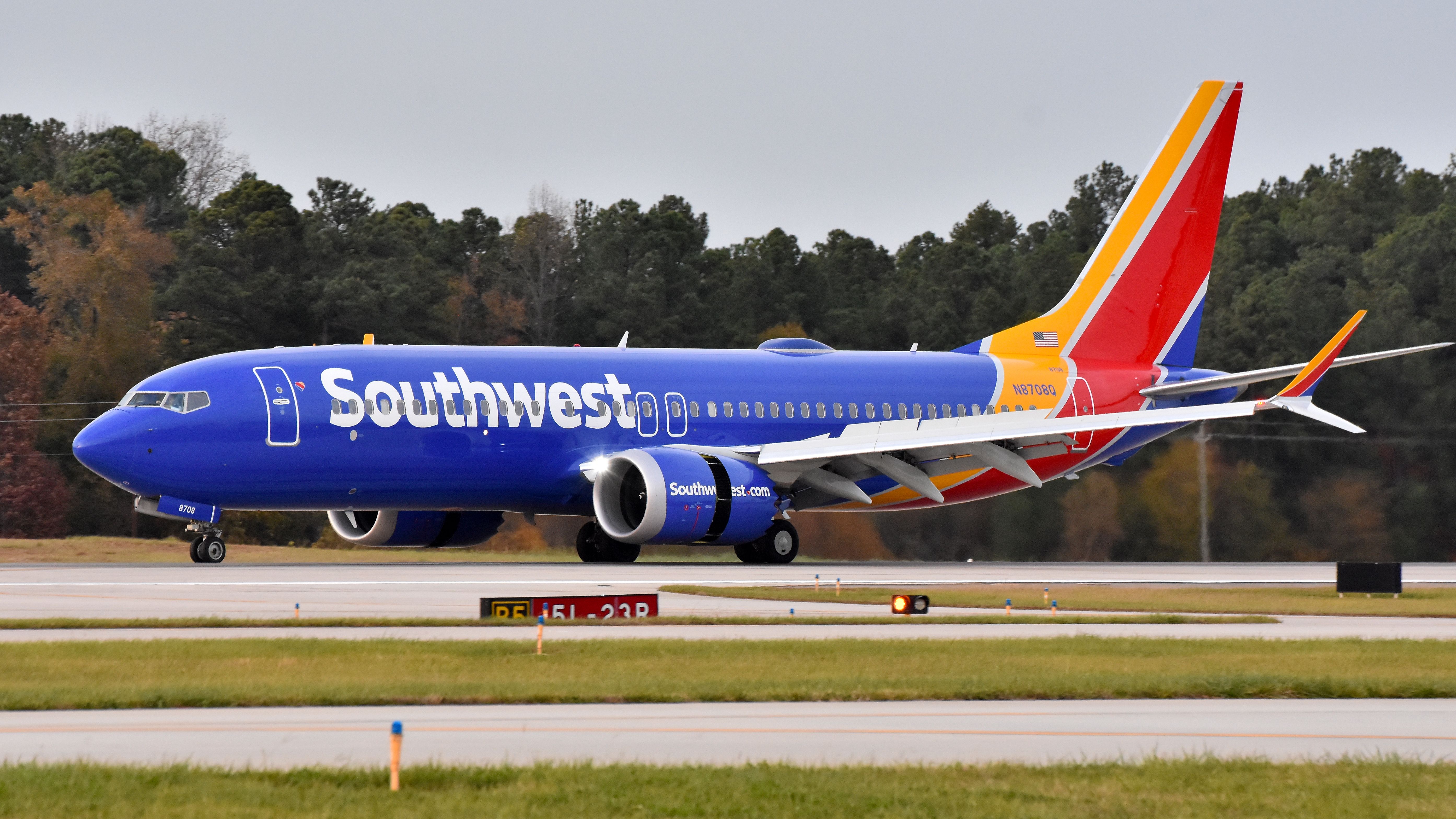 Boeing 737 MAX 8 (N8708Q) - Southwest Airlines Boeing 737 MAX 8 (N8708Q) arrives at KRDU Rwy 23R on 11/18/2017 at 4:37 pm.  This was the first 737 MAX landing on 5L/23R and the first regularly scheduled MAX route for RDU on SWA 3200.  Spotted from ramp in front of RDU observation deck.