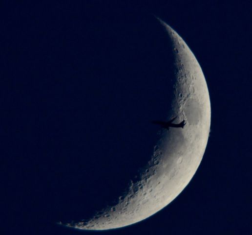 Boeing 737-800 (N560AS) - This is Alaska Airlines Flight 2 a Boeing 737-890 Seattle to Washington D.C. about 20 miles southwest of Cleveland at 37,000 ft. passing in front of The Waxing Crescent Moon. 08.04.19.