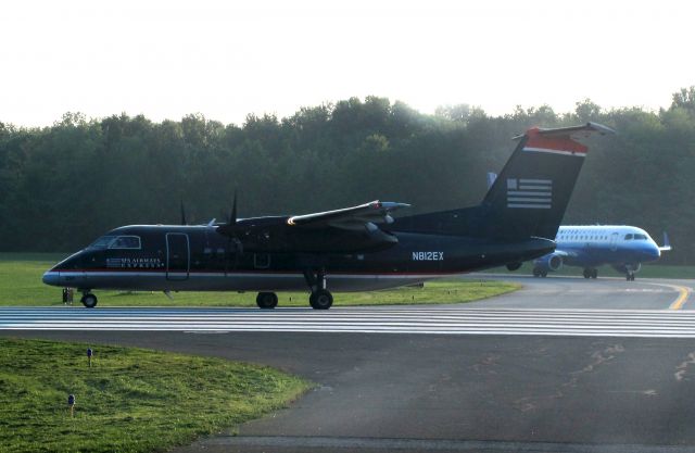 de Havilland Dash 8-200 (N812EX) - Take off RW34.