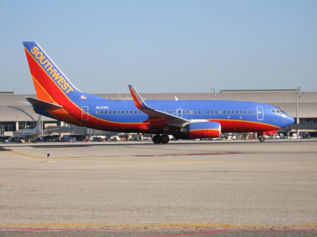 Boeing 737-700 (N221WN) - Holding on RWY 19R