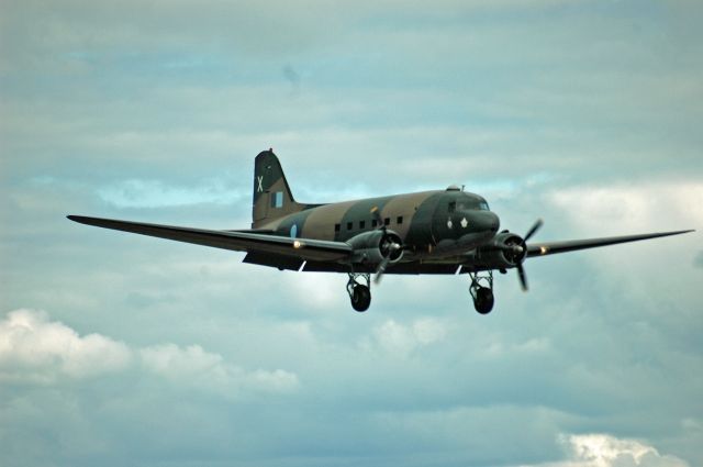 Douglas DC-3 (C-GDAK) - 1939 Douglas DC-3 Dakota (2141). On Auguist 23, 2019, I was just leaving the Peterborough airport when suddenly my daughter exclaimed: `Daddy! Look! A big plane!``. I looked up and turned my car around and managed to get into a good position to take this photo. 