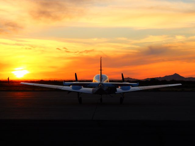 Beechcraft 55 Baron (N177AB) - N177AB at P08 sunset