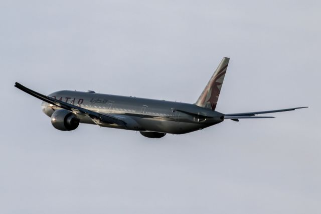 BOEING 777-300ER (A7-BAH) - QTR28 climbing into the afternoon sun on the way back to Doha.