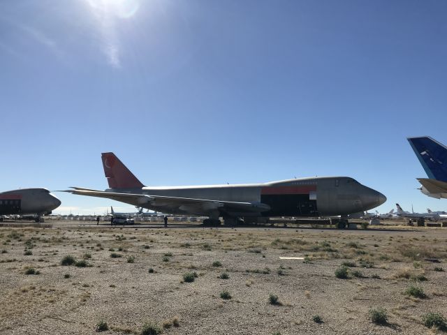 Boeing 747-200 (N618US) - Far away view of a old former NWA Cargo 747-200F set to be scrapped at the boneyard in Marana AZ If you’d like to see more about MZJ check out my YouTube video on my channel Caleb’s Aviation: Ihttps://youtu.be/TzulQXQPKeM