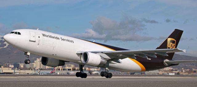 Airbus A300F4-600 (N150UP) - Runway 16R was closed, so this photo of UPS's N150UP, a heavy Bus departing for Ontario, CA, at 9:15 AM, captured it as it was rotating away from 16L directly in front of my spotting position next to taxiway Charlie.