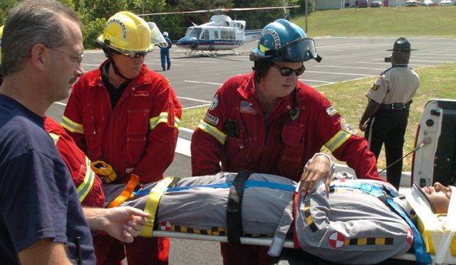 N412LG — - 1990 Bell 412 ... Carilion Life Guard 10 from Roanoke Va. sits in the background while participating in a mock accident with the Danville Life Saving Crew at Dan Daniel Park in Danville Va. 8-16-06...the patient was loaded into the Helo and transported to nearby Danville Regional Medical Center for the  completition of the drill.