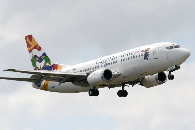 BOEING 737-300 (VP-CAY) - Check out our aviation videos with 100% authentic and non-leveled sound! a rel=nofollow href=http://youtube.com/ilikeriohttps://youtube.com/ilikerio/abr /br /Short final to runway 09 at MIA on a cloudy day! 04/15/12