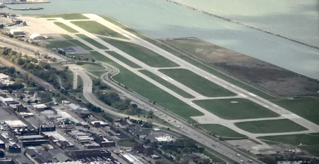 McDonnell Douglas MD-90 — - Burke Lakefront Airport seen on approach to CLE.