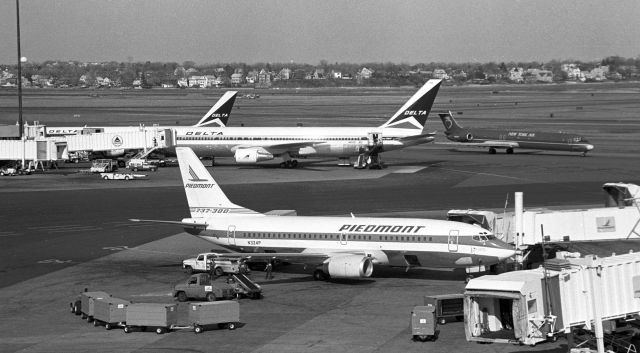 Boeing 737-700 (N324P) - 1980's. Also visible, New York Air and Delta  B-767   N122DL