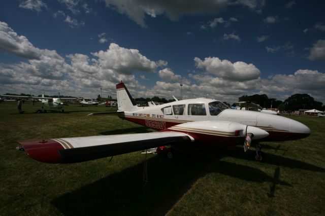 Piper Aztec (N5930Y) - See more planes from the 2013 EAA Airventure here- a rel=nofollow href=http://www.facebook.com/media/set/?set=a.10153121083865078.1073741840.283142505077&type=1https://www.facebook.com/media/set/?set=a.10153121083865078.1073741840.283142505077&type=1/a